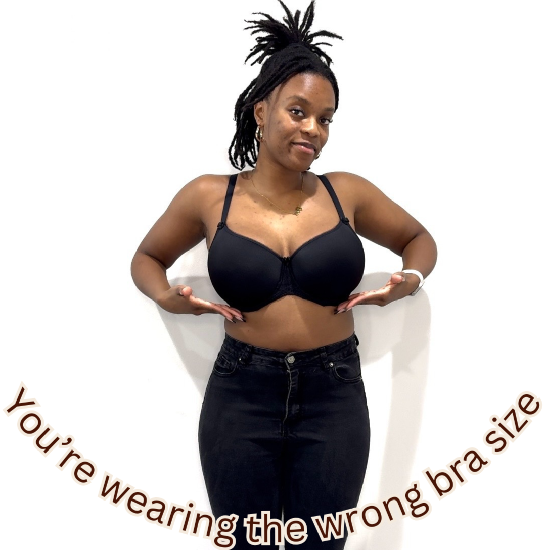 Image of Kalia, CEO of BodyCon The Brand, in a black bra and jeans with the text, 'You're wearing the wrong bra size,' emphasizing proper bra fit for fuller busts.